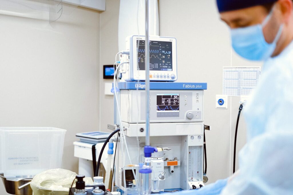Nurse attending a patient in icu at medharbour hospital